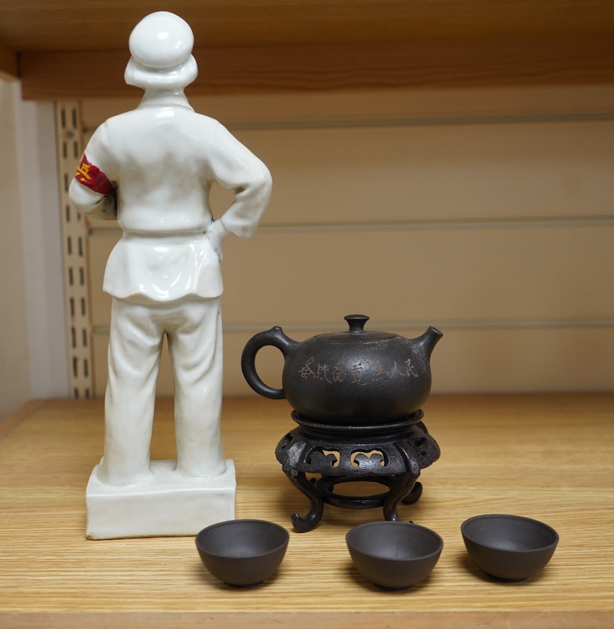 A Chinese cultural revolution Communist party figure together with a Mao teapot and three tea bowls, largest 31cm high. Condition - good